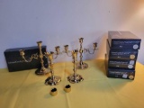 Baldwin brass candlesticks and 5 cases of Colonial Cape Cod candles