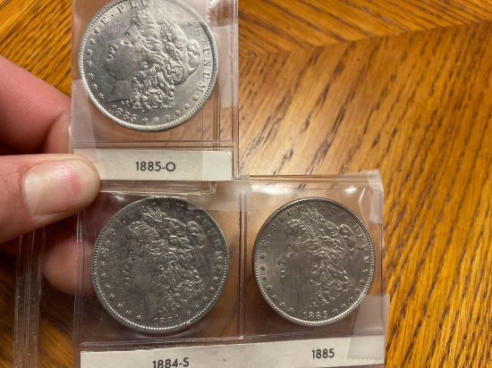 (3) Morgan Silver Dollars