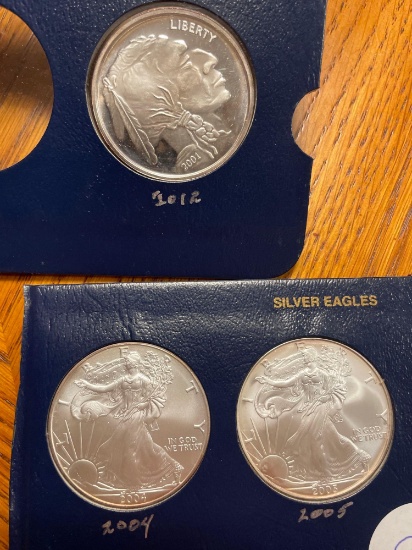 (2) Silver eagles- (1) Silver buffalo