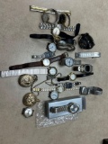 assorted men's wrist watches and pocket watches