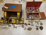 two jewelry boxes with assorted costume jewelry