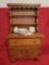 Doll hutch with 2 doors and one drawer, china, one door hinge is broke