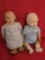 Pair of composition baby dolls, some damage