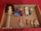 Box of vintage porcelain kewpie dolls and porcelain doll head
