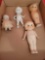 Box of assorted porcelain kewpie dolls