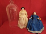 Pair of German china head dolls, one with globe and other with chair