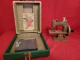 Childs Singer Sewhandy model 20 sewing machine with case and book