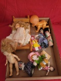 Box of plastic and composition dolls, doll bed