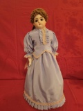 Porcelain head doll marked F, composition body