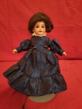 Small porcelain head doll unmarked