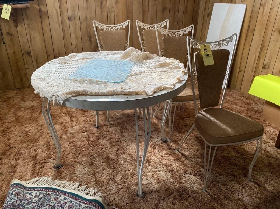 Wrought Iron Dinette table and 5 chairs