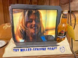 Miller genuine draft roaring beer sign