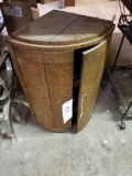 Early oak corner cabinet, barrel style