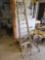 aluminum step ladder, scrapper, and wood blocks