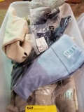 Tote of new Duluth socks and izod sweaters