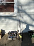 5 fishing poles with tackle box