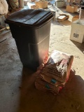 trash can and two bags layer pellet feed