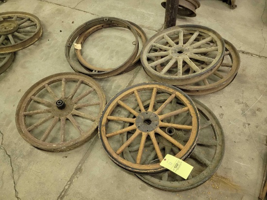 5 wooden spoke wheels and 2 steel rims