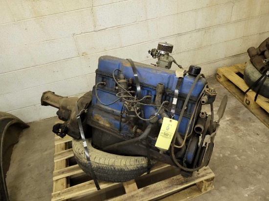 6 cylinder Chevy motor with transmission, most of ignition, and carburetor