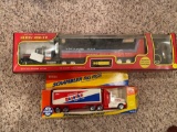 (2) toy trucks