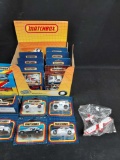 Assortment of Matchbox Cars & Vehicles in Display, Gold Collection Dodge Viper, & Biplane