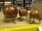 3 wooden globes