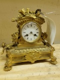 Early metal clock with key