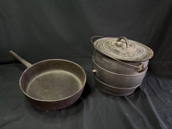 Antique footed cast iron skillet and covered pot