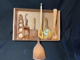 Box of wood spoons and utensils, some handpainted