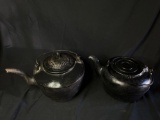 Pair of cast iron kettles