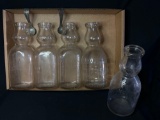 Box of milk bottles with cream tops, cream spoons, chestnut, gold meadow