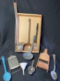 Box of assorted vintage utensils, enameled spoons, copper ladel, grater