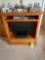 2015 Samsung 28 inch flatscreen tv w/ oak cabinet and electronics