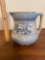 Blue and white stoneware pitcher with Dutch windmill scene