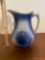 Blue and white stoneware pitcher with fish scale pattern