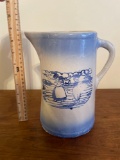 Blue and white stoneware pitcher with Dutch boy and girl and windmill