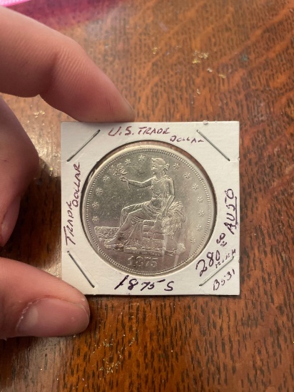 1875-S AU 50 US trade dollar