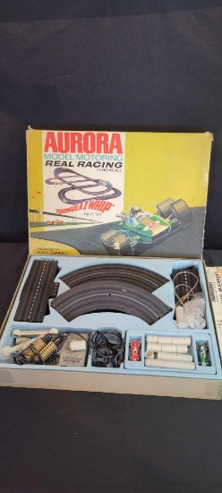 Aurora real racing Formula I Whip HO slot car set, with 2 cars
