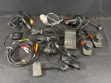 Assorted Power Cables and Atari Controllers