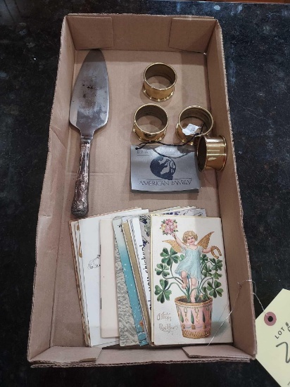 Assortment of Vintage Postcards, Silver Plated Cake Knife, & Brass Napkin Holders