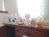 Contents of Buffet including Vases, Holiday Decor, Avon Figurines, Knife Set and Linens