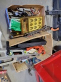 Levels, socket, pliers, pipe cutter, channel locks, and more