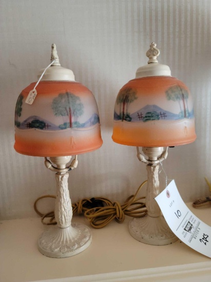 pair of metal table lamps with reverse painted shades