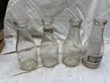 (4) Early glass milk bottles