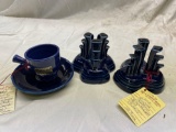 Fiesta coffee cup and saucer, pyramid candle holders-discontinued color cobalt blue