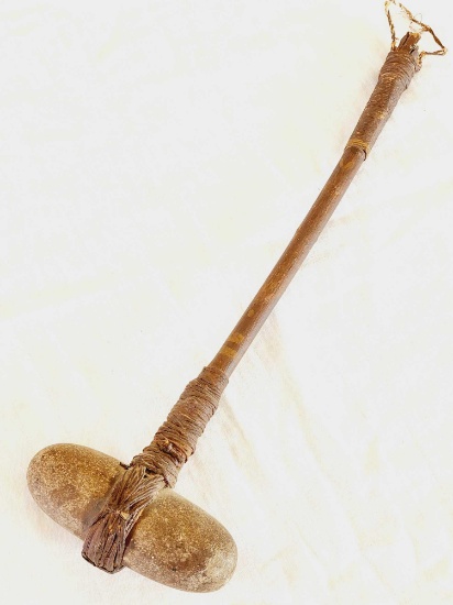 Unusual Native stone tool, affixed to wooden handle