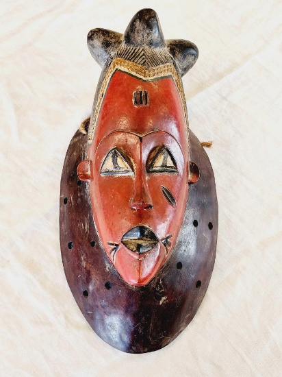 Polychrome painted African wooden mask