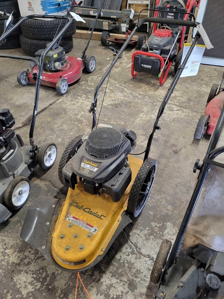 Cub cadet ST 100 22in wheeled string trimmer | Online Auctions | Proxibid