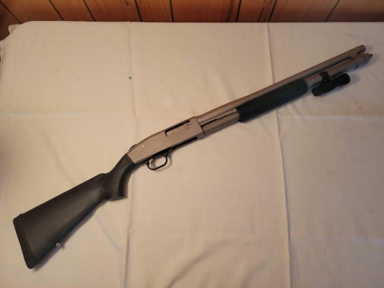 Mossberg 12ga pump action shotgun 2... and 3in chamber 20in cylinder bore with laser and soft case