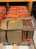 metal folding chairs tan & orange with 2 carts bid x 85